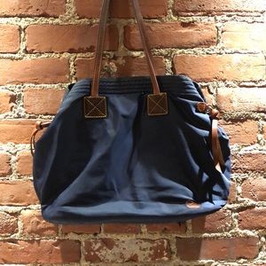 Dooney & Bourke navy purse with pink interior